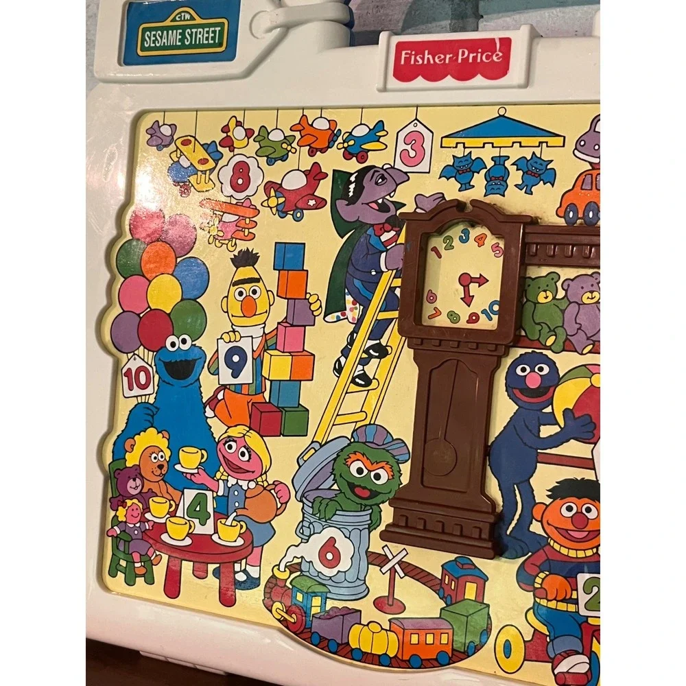 Vintage Fisher-Price Talk'n Teach Tag Along Sesame Street The Counting Toy Store